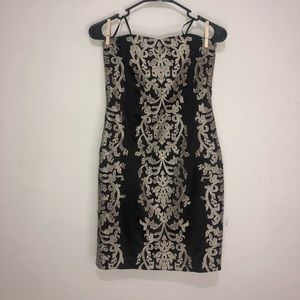 Strapless embroidered black and gold dress